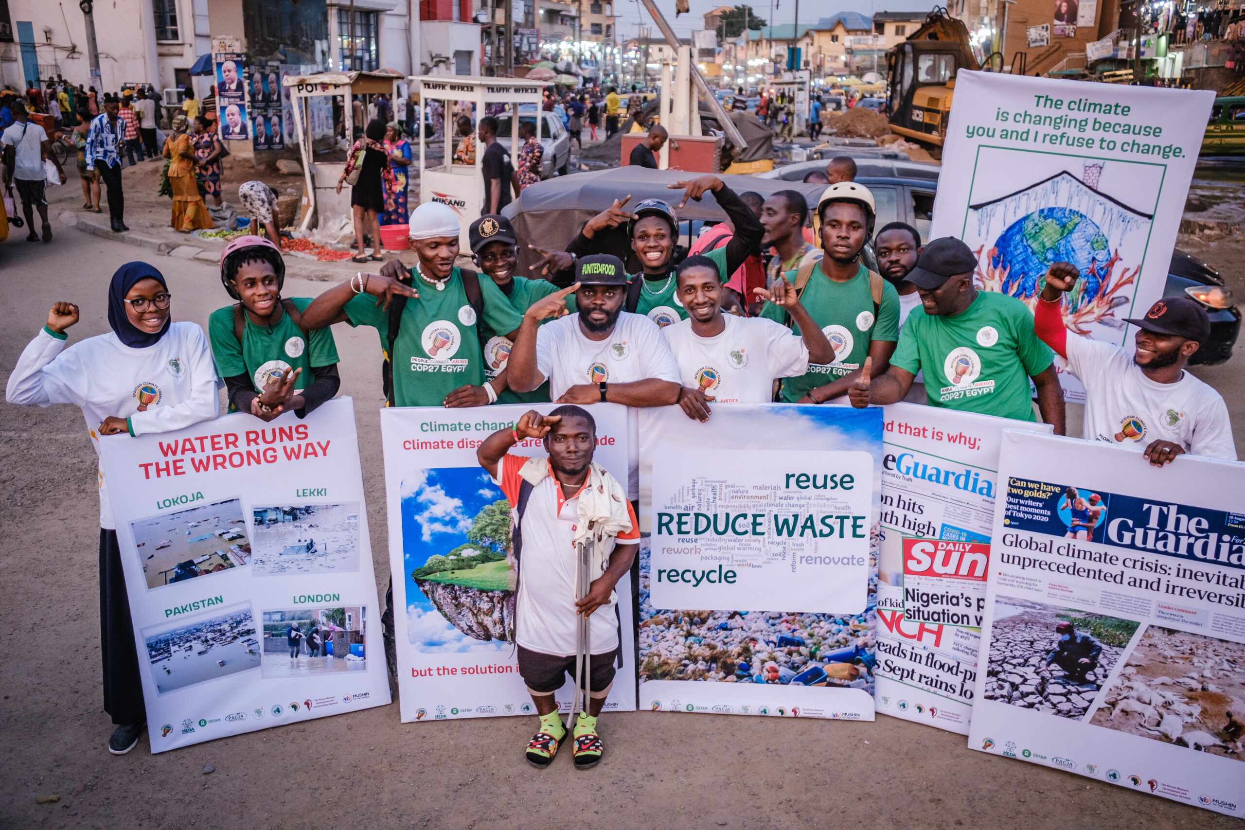 LAGOS, NG - OCTOBER 13, 2022: Group photograph of volunteers and skaters which marks the end of caravan climate change walk on October 13, 2022 in Ikeja, Lagos State, Nigeria. CREDIT: Taiwo Aina for Oxfam Novib